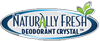 Loggan utgörs av texten Naturally Fresh - Deodorant Crystal. Texten finns i en cirkel och nåra bokstäver har gröna blad stickande ut från sig. 