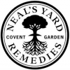 Rund svart cirkel med ett träd inuti och Neal´s Yard Remedies runt kanterna